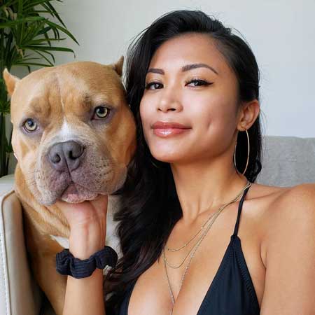 Chanel Uzi with her pet dog