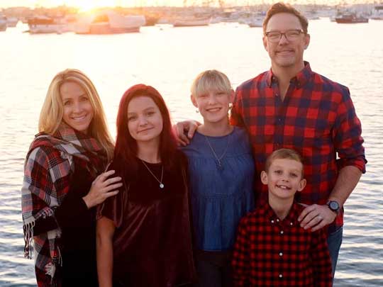 Heather Helm with her husband and children