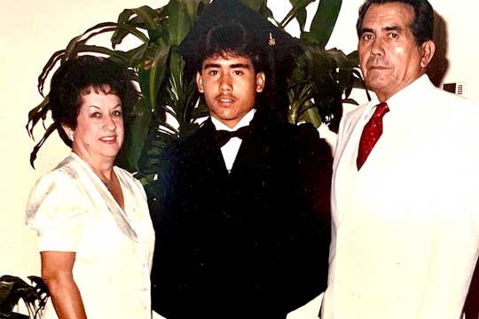 Arbello Barroso with his parents