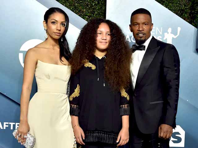 Annalise Bishop with her father Jamie Foxx & sister Corinne Foxx attending SAG Awards 2020