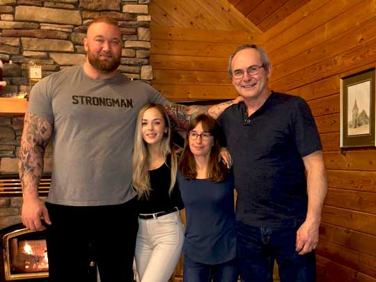 Kelsey Henson with her parents and husband Hafthor Bjornsson