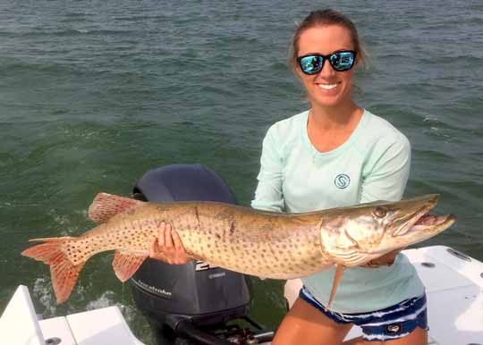 Vicky Stark catching fish