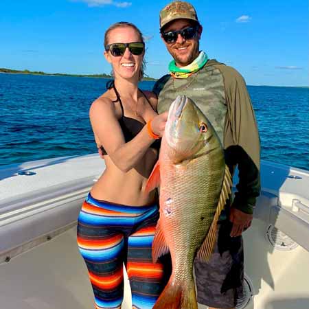 Vicky Stark with Capt. Ryan Eidelstein